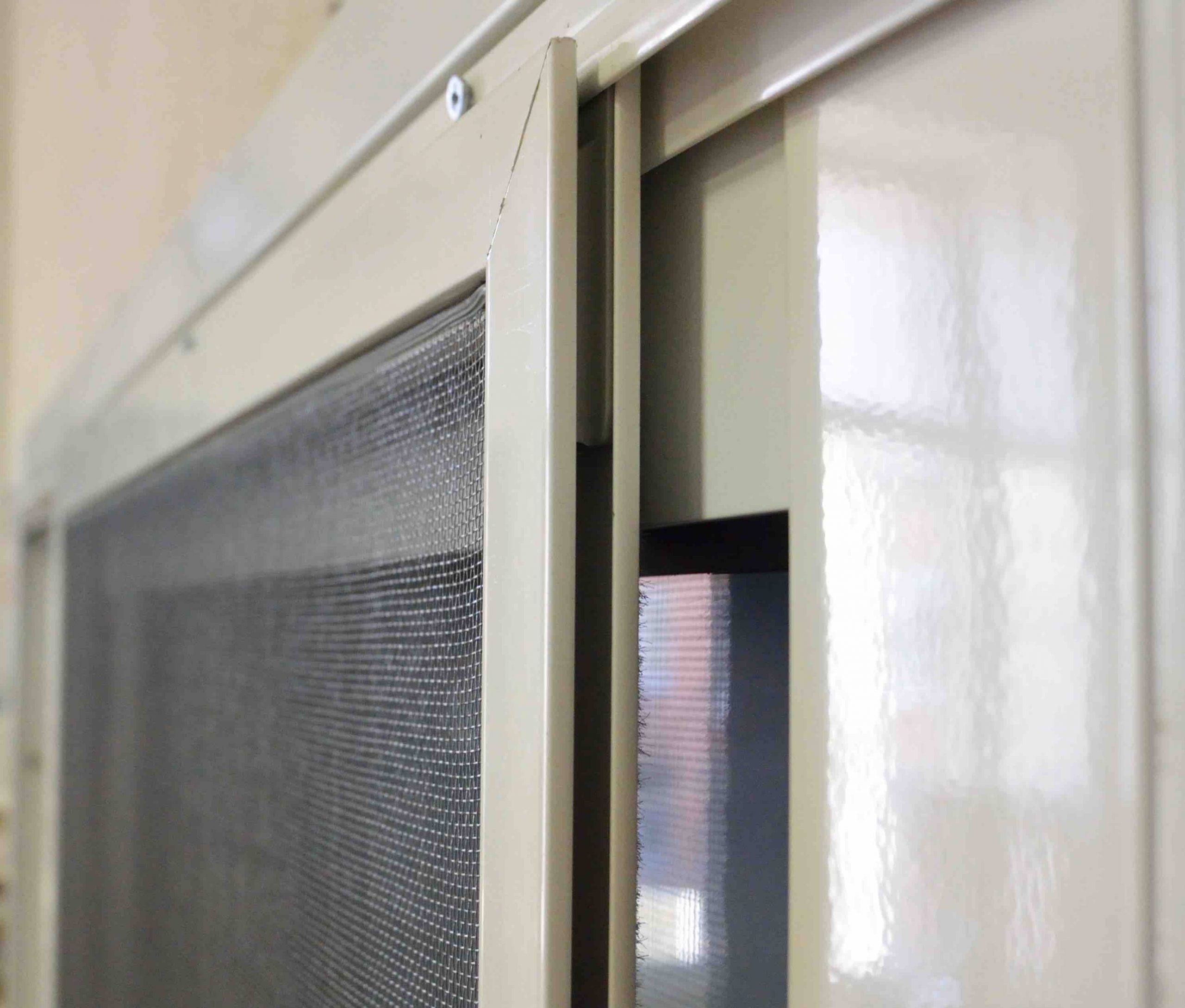 slide mosquito net on the balcony glazing